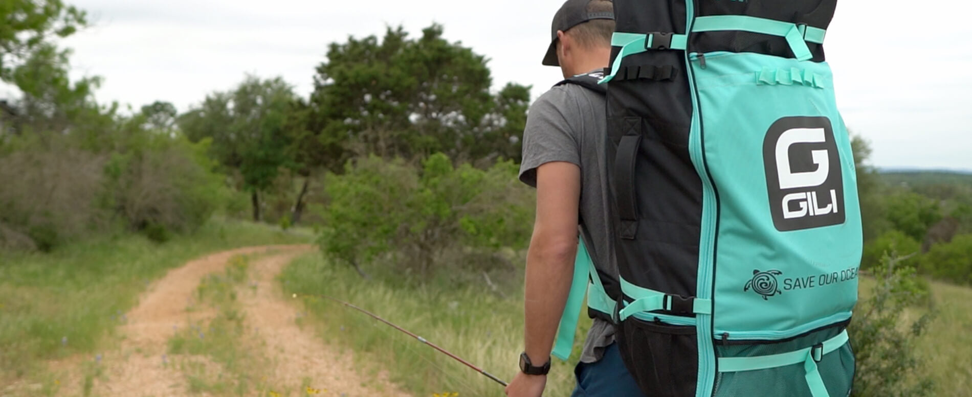 Man walking with a GILI SUP backpack