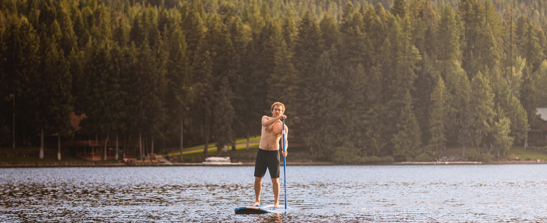 Man paddle boarding in Montana